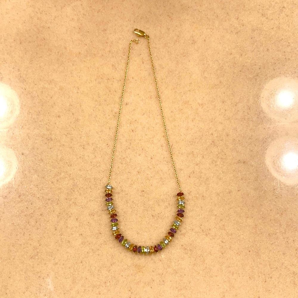 Gold colored necklace
